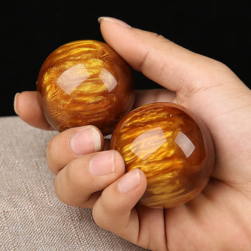 Boule de massage en cire d'abeille ambre